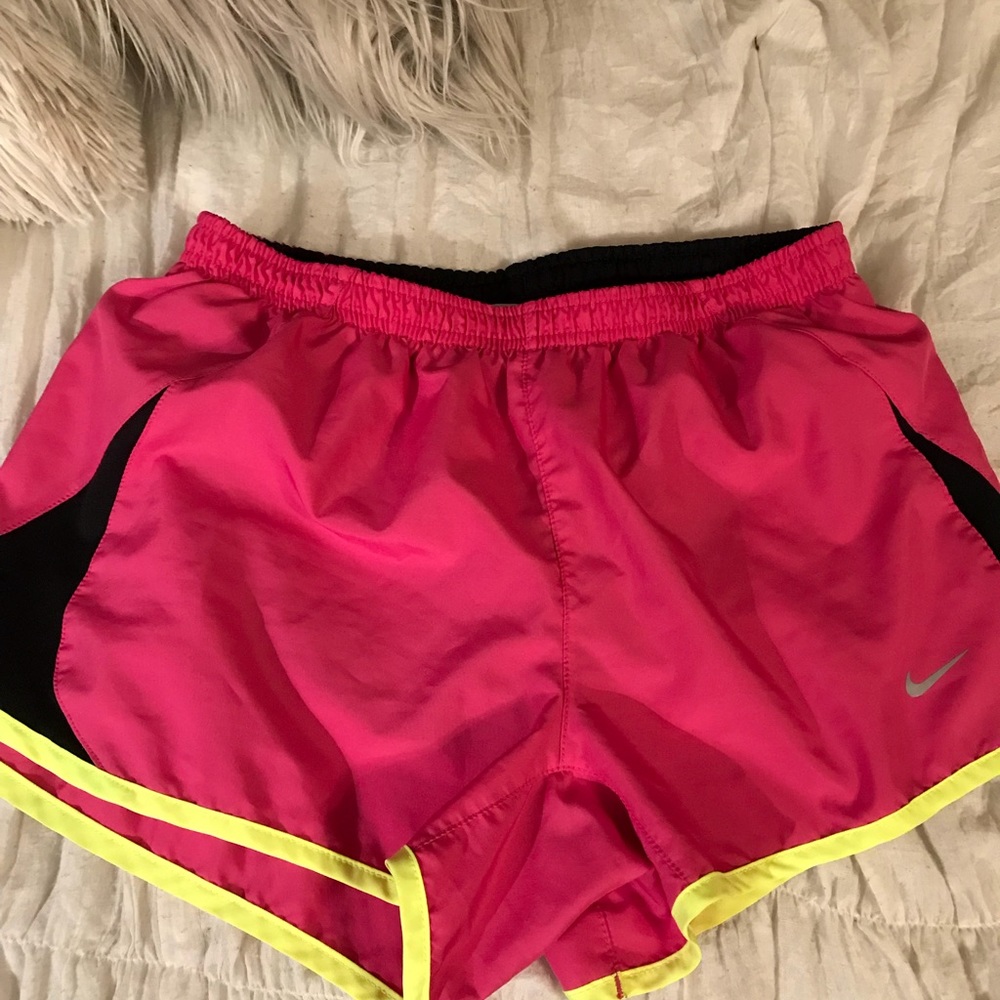 pink and yellow nike shorts